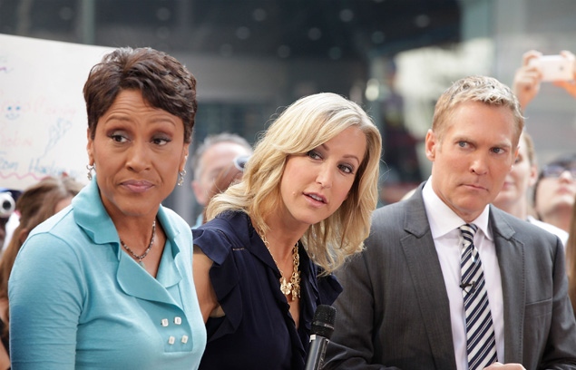 NEW YORK, NY - MAY 26:  (L-R)  Robin Roberts, Lara Spencer and Sam Champion appear on Good Morning America in Times Square  on May 26, 2011 in New York City.  (Photo by John Lamparski/WireImage)